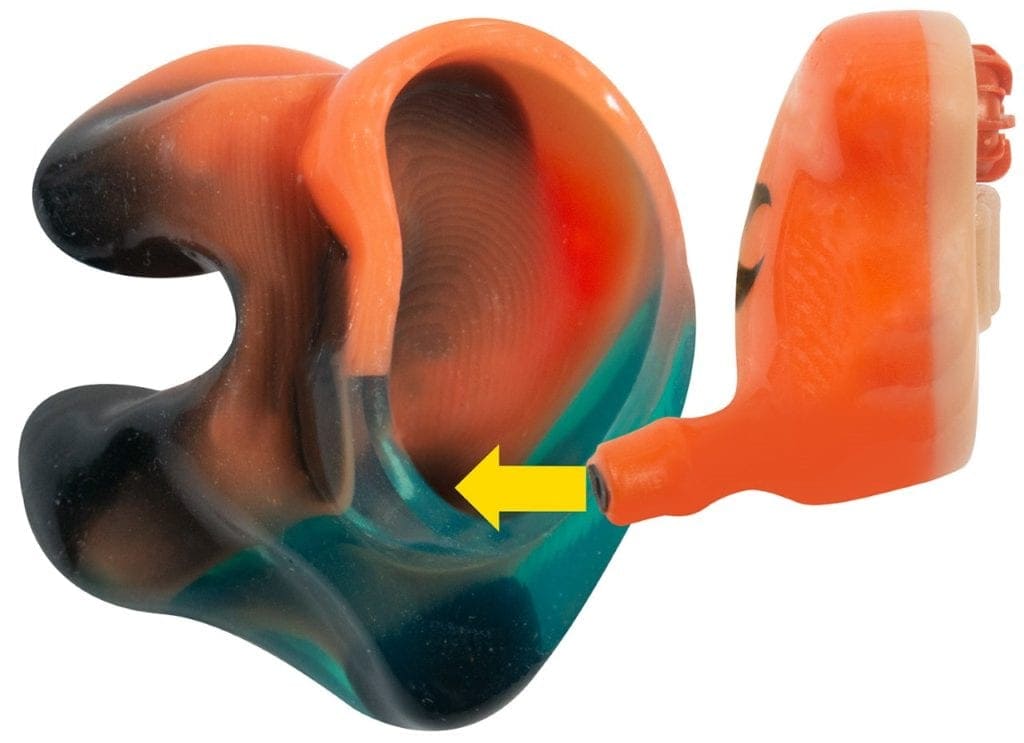An arrow guides to the Chameleon Ear™ PRO ShotHunt™ into the sleeve.