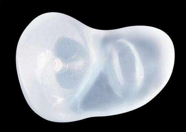 Sleep Plugs Plus custom earplugs for sleeping on a black background
