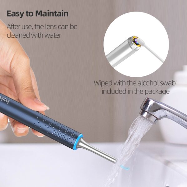 A person cleaning an EAR/BeBird M9-S otoscope with water. It can also be cleaned with alcohol swab.